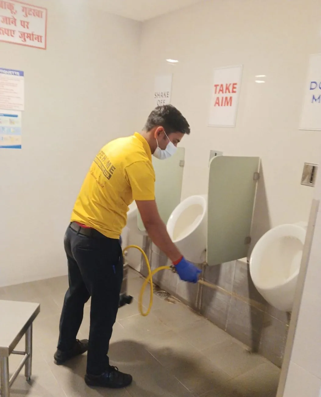 Safe Home technician disinfecting a washroom
