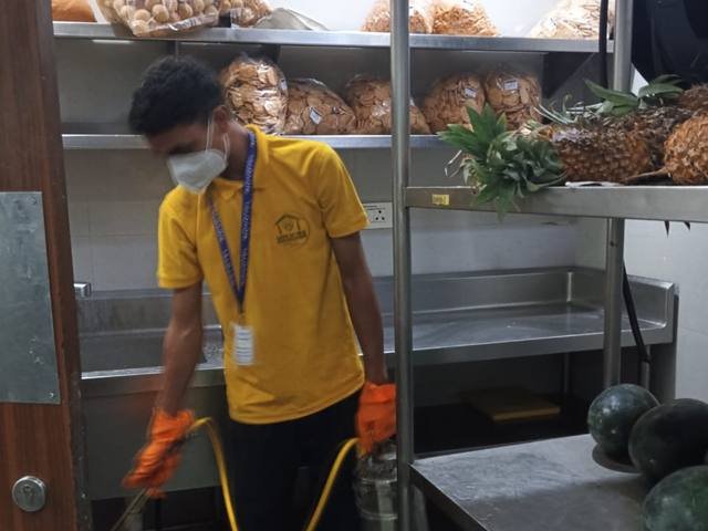 Treating storage racks in a chilled store