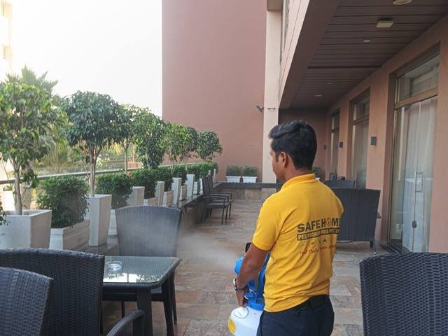 Treating an outdoor restaurant seating area